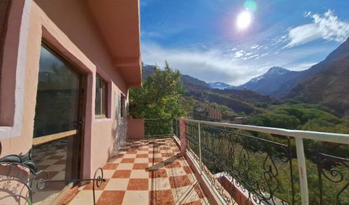 a balcony with a view of the mountains at Atlas Rooftop Imlil in Imlil
