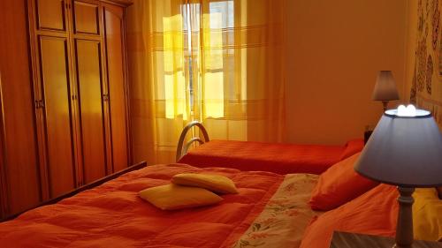 Ένα ή περισσότερα κρεβάτια σε δωμάτιο στο Agriturismo San Giusto