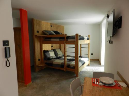 Poschodová posteľ alebo postele v izbe v ubytovaní GB Affitti Brevi