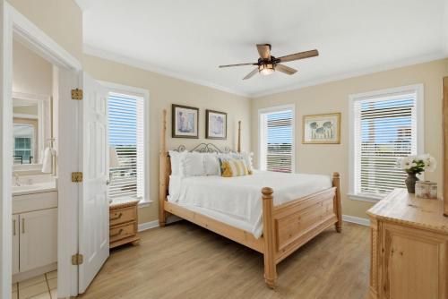 a bedroom with a bed and a ceiling fan at USA II in Gulf Shores