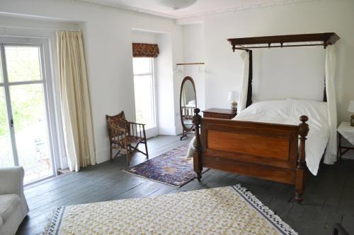 Un pat sau paturi într-o cameră la 8a Spring Gardens