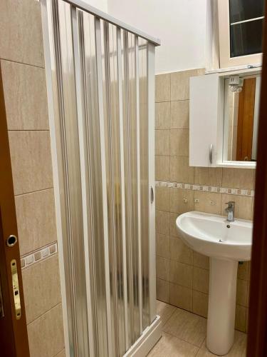 a bathroom with a shower and a sink at diamond room in Palmi