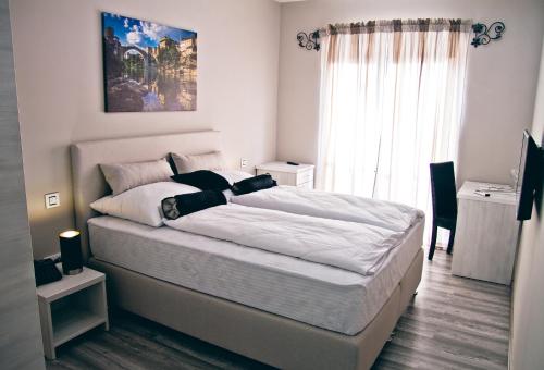Hotel Bakarni Lonacにあるベッド