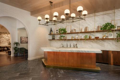 a bathroom with a sink in a room at Halcyon, a hotel in Cherry Creek, Denver in Denver