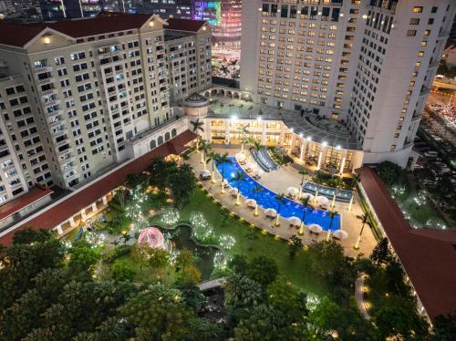 an aerial view of a park at night at Hanoi Daewoo Hotel in Hanoi