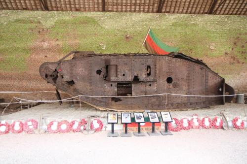 a large boat is on display in a building at ibis Cambrai in Cambrai