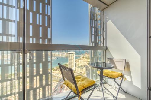 Sea Views from Living to Bedroom Perfect for Staycation, Cayan Tower, Dubai Marina by Deluxe Holiday Homes