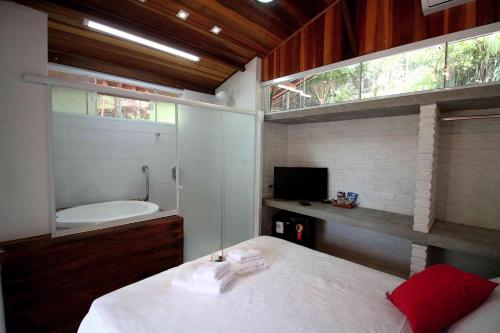 Katil atau katil-katil dalam bilik di Chácara Andó Bed And Breakfast