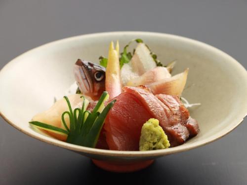 a bowl of food with meat and vegetables in it at Nagataki in Nakatsugawa