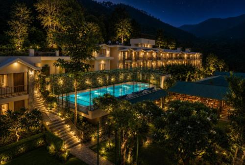 an aerial view of a hotel at night at Sterling Corbett in Marchula