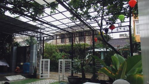 a greenhouse with a bunch of plants in it at Ngọc Sinh Homestay in Hoi An