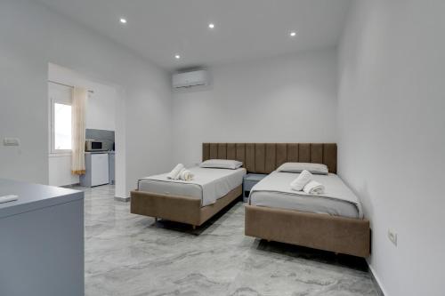 Llit o llits en una habitació de Villa Alsa Berat