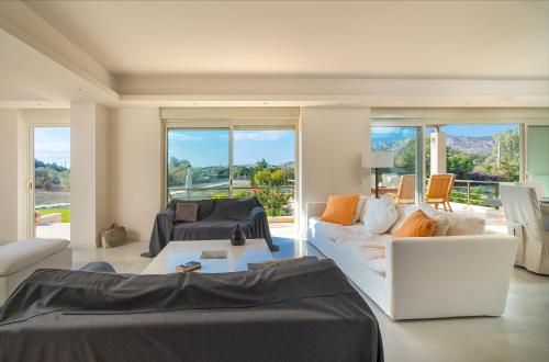 A seating area at Legrena Beach Villa