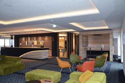 SKY Hotel Cloppenburgにあるシーティングエリア