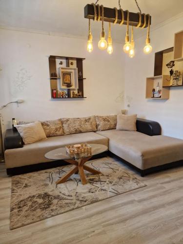 a living room with a couch and a table at Z-apartment in Tryavna in Tryavna