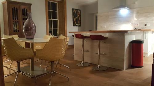 Η κουζίνα ή μικρή κουζίνα στο Grigshot Apartment
