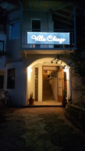 a entrance to a building with a sign on it at Villa Chingo in Ohrid