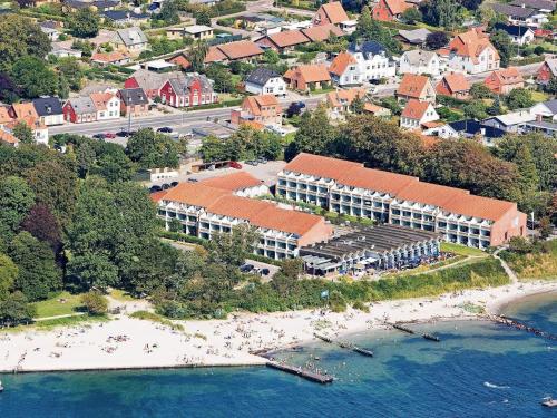 an aerial view of a resort on a beach at 6 person holiday home on a holiday park in Faaborg in Faaborg