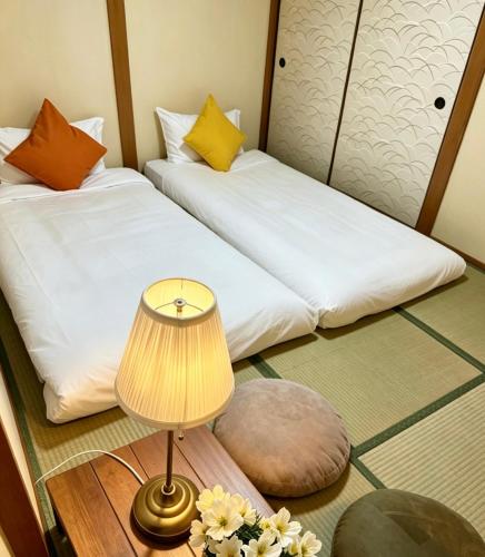 岸里玉出站三层家庭一户建 五分钟地铁站近心斋桥难波动漫街 可住10人 清风