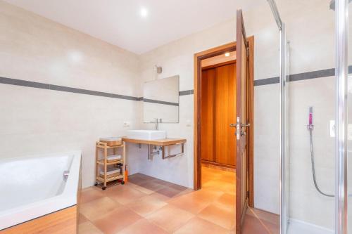 a bathroom with a sink and a shower at Can Raia in Sóller