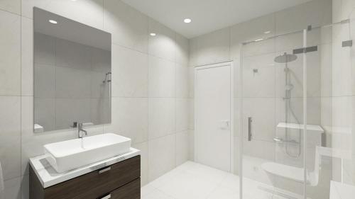 a white bathroom with a sink and a shower at Ferienwohnung Apartment am Moosrain in Eitting