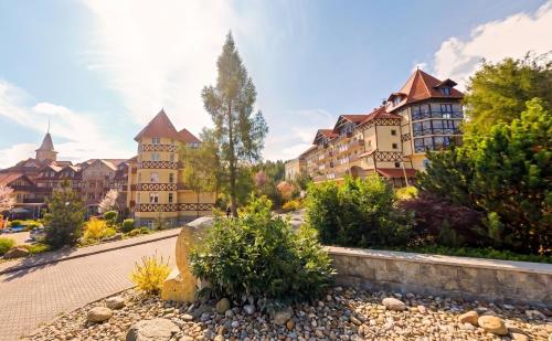 a view of the resort from the garden at Santa Christina Mountain Resort in Świeradów-Zdrój