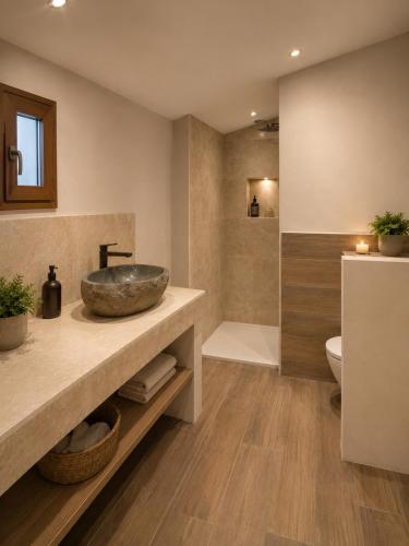a bathroom with a sink and a toilet at Domaine l Alba Scelta in Ucciani