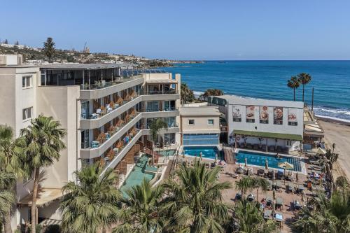 an aerial view of the hotel and the beach at Enorme Infinity Beach ex Infinity Blue in Hersonissos