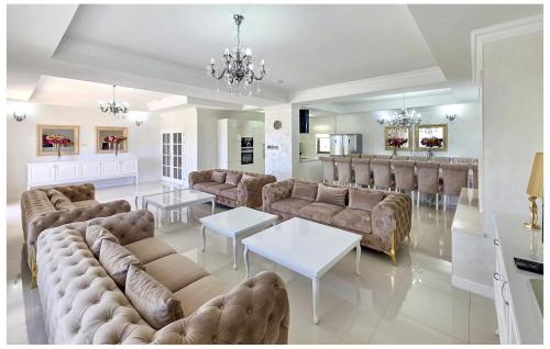 a large living room with couches and a table at Amazing Home In Imotski With Sauna in Imotski