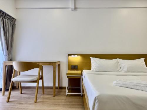 Postel nebo postele na pokoji v ubytování LIMOR hotel