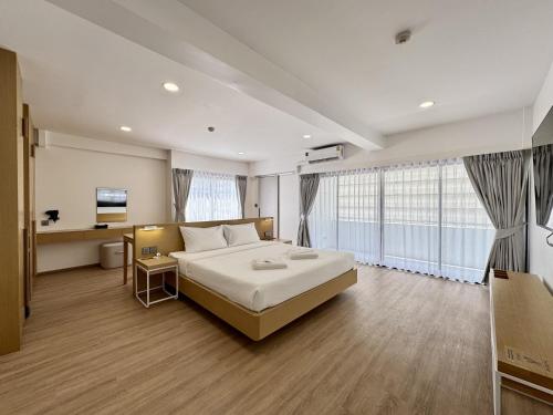 Postel nebo postele na pokoji v ubytování LIMOR hotel