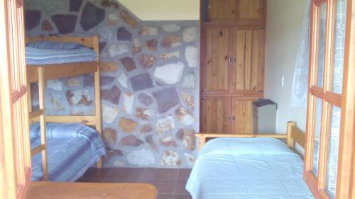 Postel nebo postele na pokoji v ubytování Posada Tajaluz