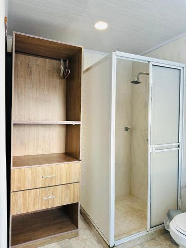 a bathroom with a shower and a toilet at Casona La Española in Cartagena de Indias