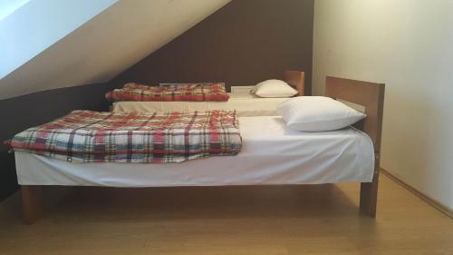 Cama o camas de una habitación en Guest House Boska