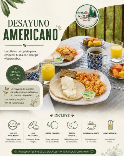 a table with two plates of food and orange juice at Ecoparque Hotel El Cielo Cabañas in Carmen de Viboral