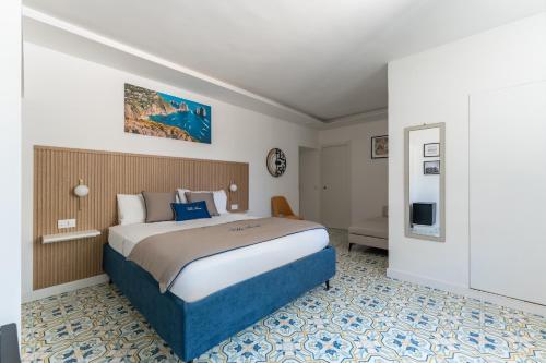 a bedroom with a large bed in a room at Villa Anna in Meta