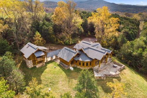 an aerial view of a house in the woods at Hamatreya- Panoramic Shenandoah Views in Rileyville