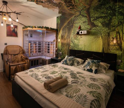 a bedroom with a large bed and a chair at JACUZZI & SAUNA Apartament Warszawa Wola in Warsaw