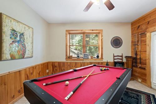 a pool table in a living room with at Eagles View in Boone