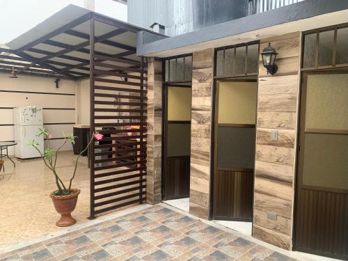 a building with a patio with a wine rack at Acacias home in Acacías