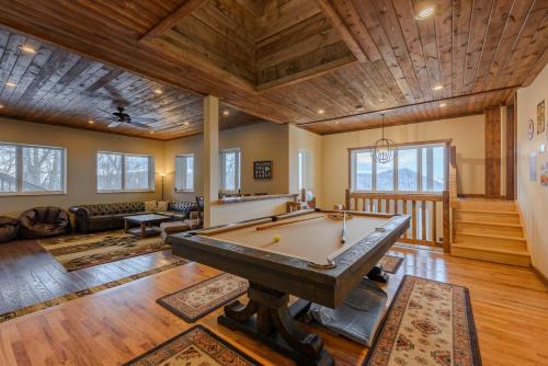 a living room with a pool table in it at Bear The View in Seven Devils
