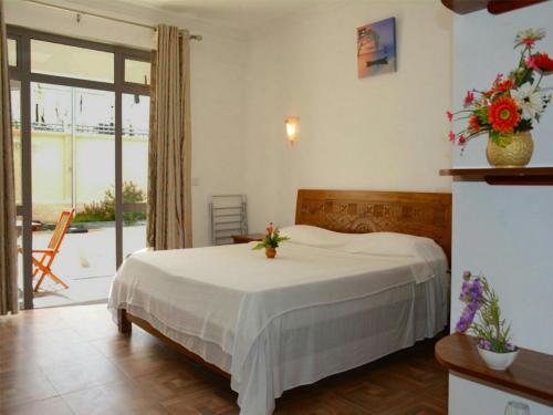Una cama o camas en una habitación de Easy Stay Residence