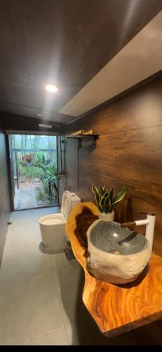 a bathroom with a sink and a toilet at Valley homestay Dalat in Da Thien