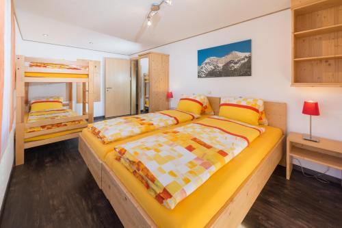 Ένα ή περισσότερα κρεβάτια σε δωμάτιο στο AZapartments Clarino