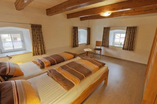 
Ein Bett oder Betten in einem Zimmer der Unterkunft Ferienhaus Wimbauer
