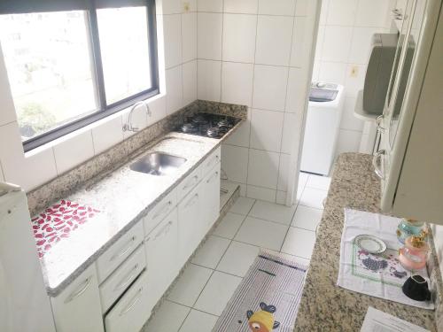 Ein Badezimmer in der Unterkunft Apartamento Balneário Camboriú