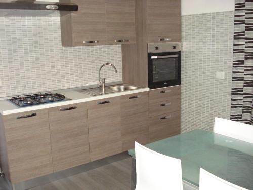 Η κουζίνα ή μικρή κουζίνα στο Casa Vacanza Cleo