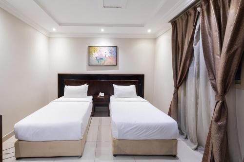 Легло или легла в стая в Taleen Serviced Apartments Al Aqiq- تالين العقيق للشقق المخدومة