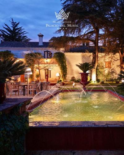 a water fountain in front of a building at Hotel Boutique Palacio del Moral in Ronda