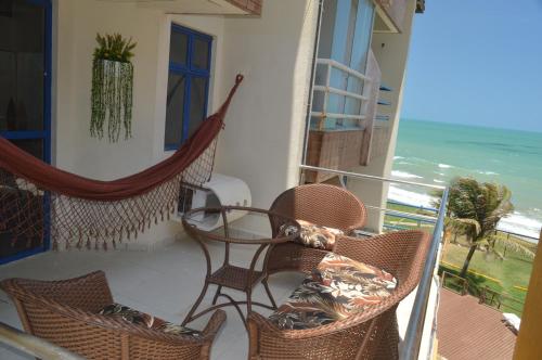 Un balcón o terraza de Costeira Praia Apartamento